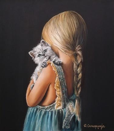 Little girl with a kitten