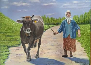 An old woman with a cow