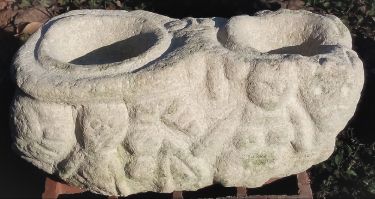 Prehistoric stone vessel with relief