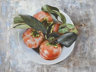 Ripe Persimmons with Green Leaves in White Bowl by Alena Savchenko - Lukian