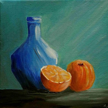 A vase and an orange