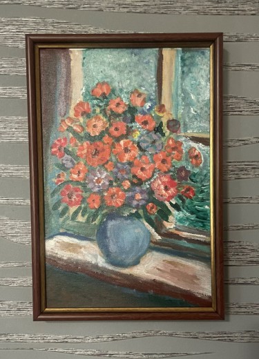 Red flowers by the window by Biljana Pejcic