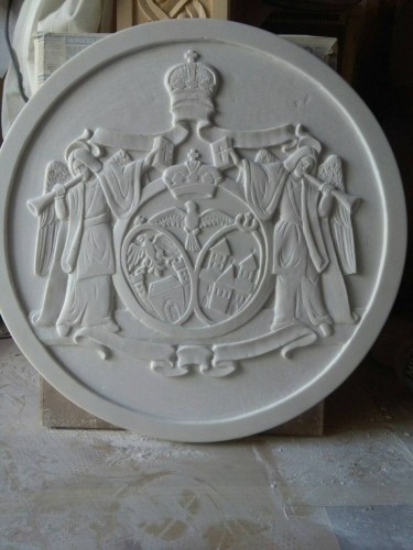 coat of arms of the diocese carved in marble by Sasa Kolbas
