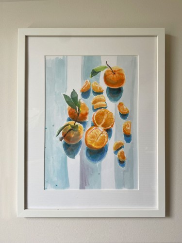 Peeled tangerine in the morning sun by Marko Kraguljac