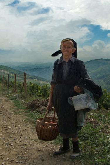 Woman with a basket by Слободан Симић