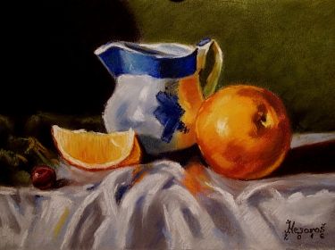 Pitcher and oranges